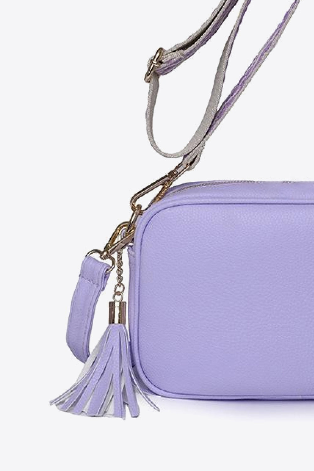 Vegan Leather Tassel Crossbody Bag - Add a touch of playful sophistication!