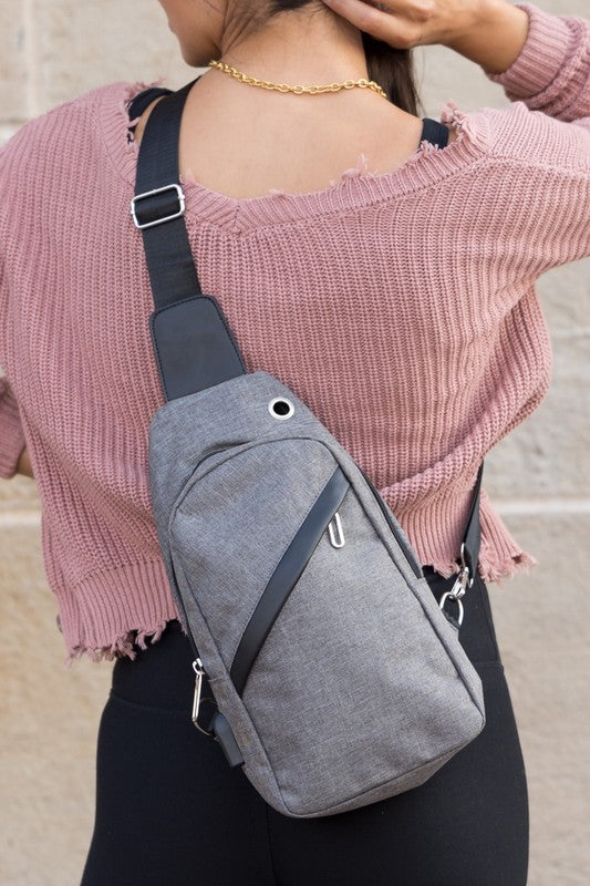 Cross Zip Sling Bag Canvas Exterior Nylon Interior Adjustable Strap Multiple Pockets Earphone Slot Silver Hardware