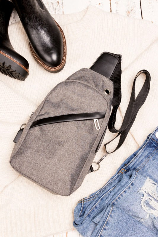 Cross Zip Sling Bag Canvas Exterior Nylon Interior Adjustable Strap Multiple Pockets Earphone Slot Silver Hardware