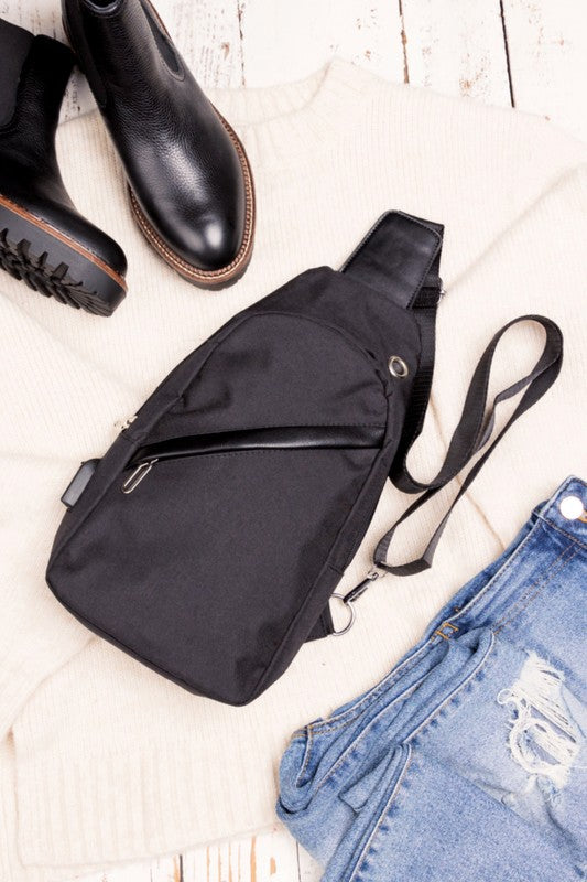 Cross Zip Sling Bag Canvas Exterior Nylon Interior Adjustable Strap Multiple Pockets Earphone Slot Silver Hardware