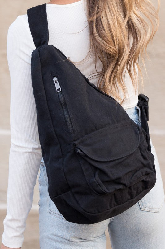 Oversized Canvas Sling Bag with Adjustable Strap Side Zip Closure Front Velcro Pocket Interior Zip Pocket