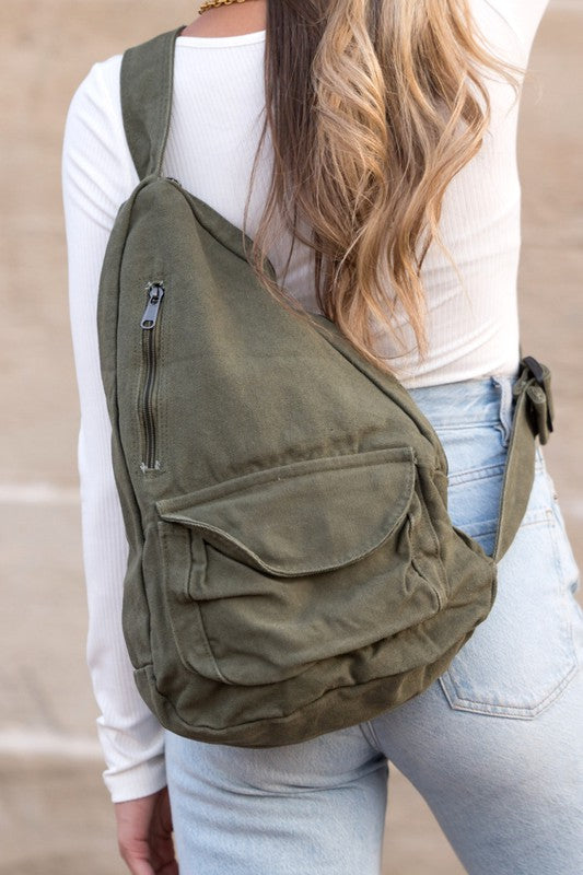 Oversized Canvas Sling Bag with Adjustable Strap Side Zip Closure Front Velcro Pocket Interior Zip Pocket