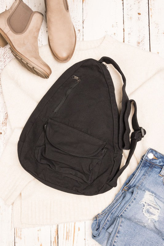 Oversized Canvas Sling Bag with Adjustable Strap Side Zip Closure Front Velcro Pocket Interior Zip Pocket