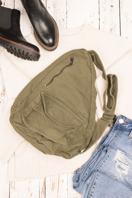 Oversized Canvas Sling Bag with Adjustable Strap Side Zip Closure Front Velcro Pocket Interior Zip Pocket