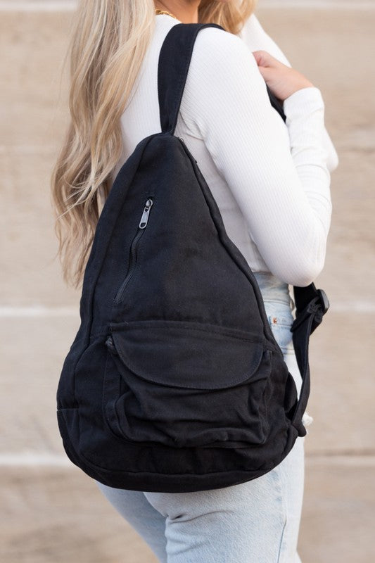 Oversized Canvas Sling Bag with Adjustable Strap Side Zip Closure Front Velcro Pocket Interior Zip Pocket