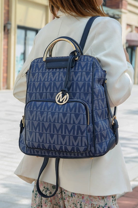 MKF Collection Cora Milan Backpack Faux Leather Two Zippered Pockets Adjustable Strap Front Pocket Zip Top Closure