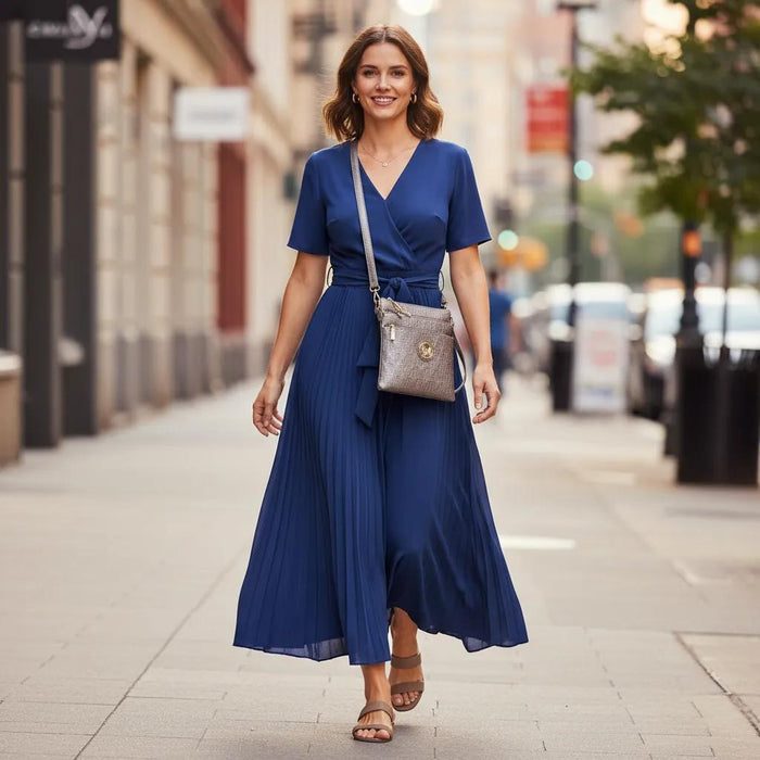 Petite woman with handbag by red Mini Cooper