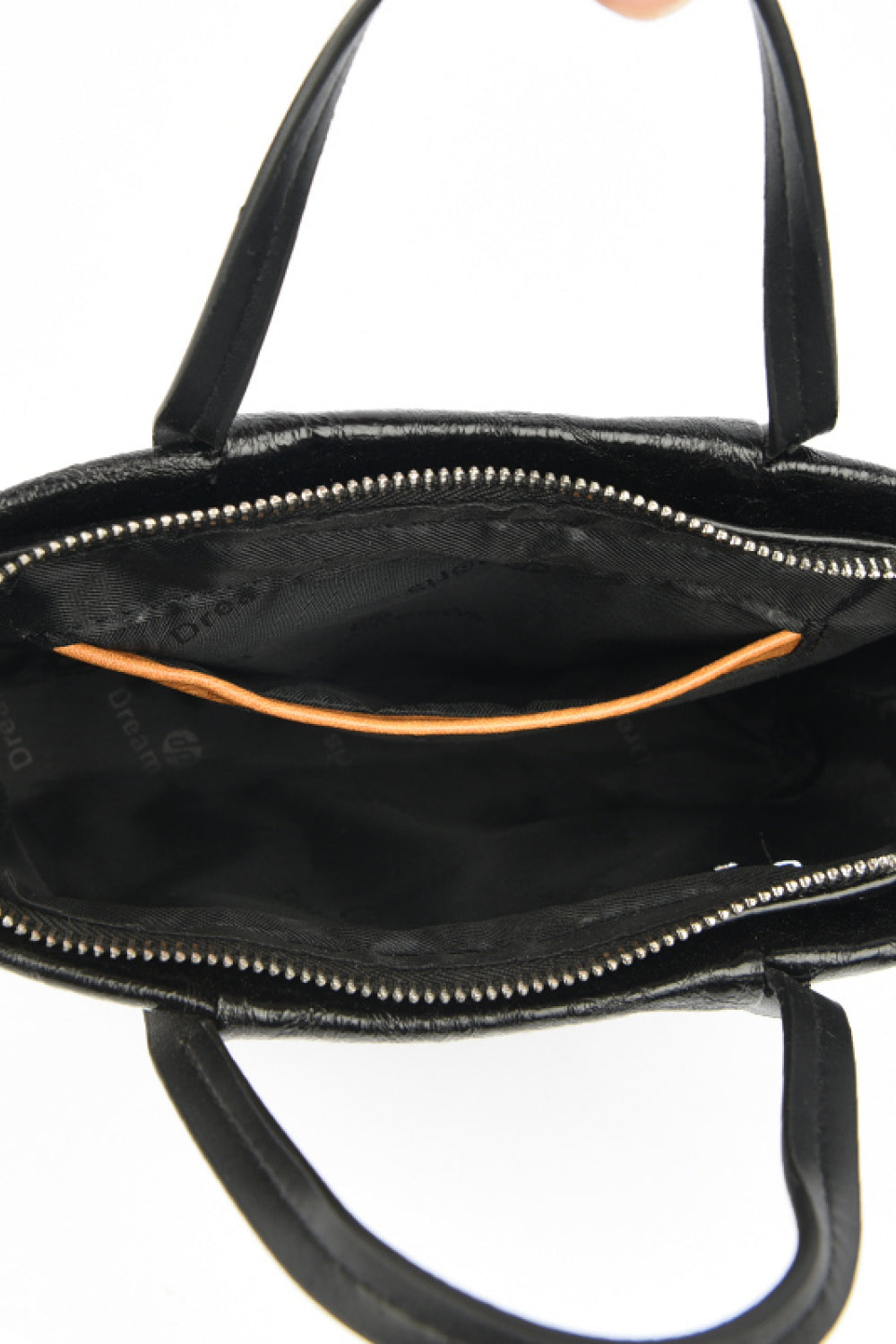 Vegan Leather Handbag - Elevate your style with this chic and versatile design!