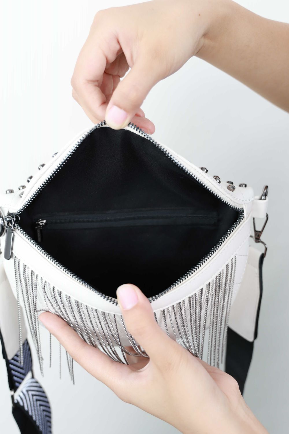 Adored Vegan Leather Studded Sling Bag with Fringes - Edgy Elegance for the Free Spirit!