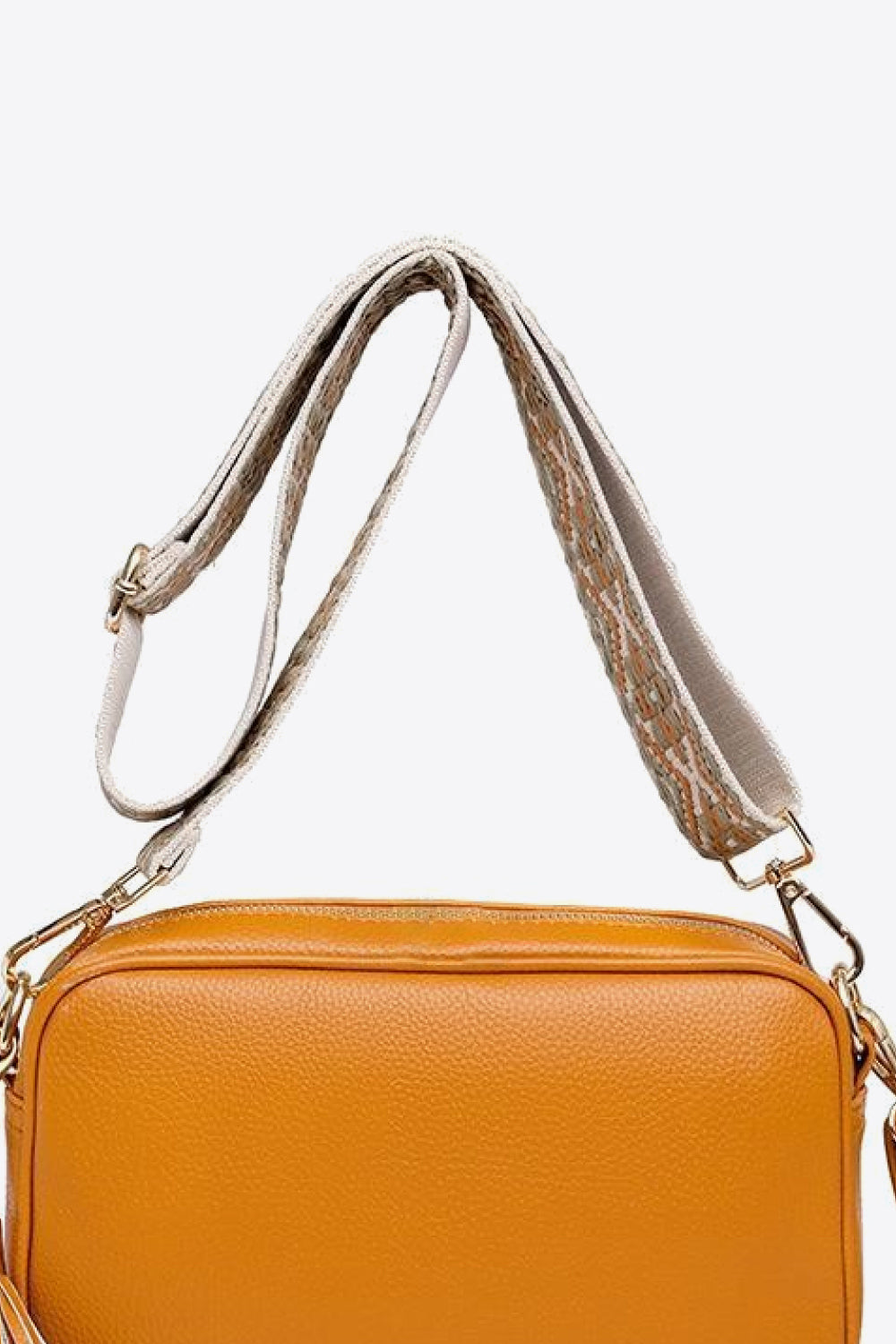 Vegan Leather Tassel Crossbody Bag - Add a touch of playful sophistication!