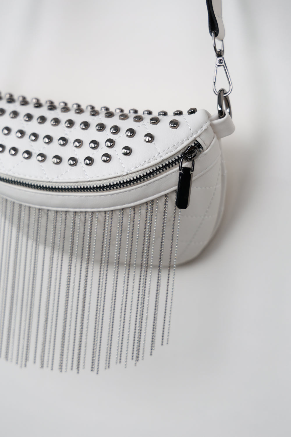 Adored Vegan Leather Studded Sling Bag with Fringes - Edgy Elegance for the Free Spirit!