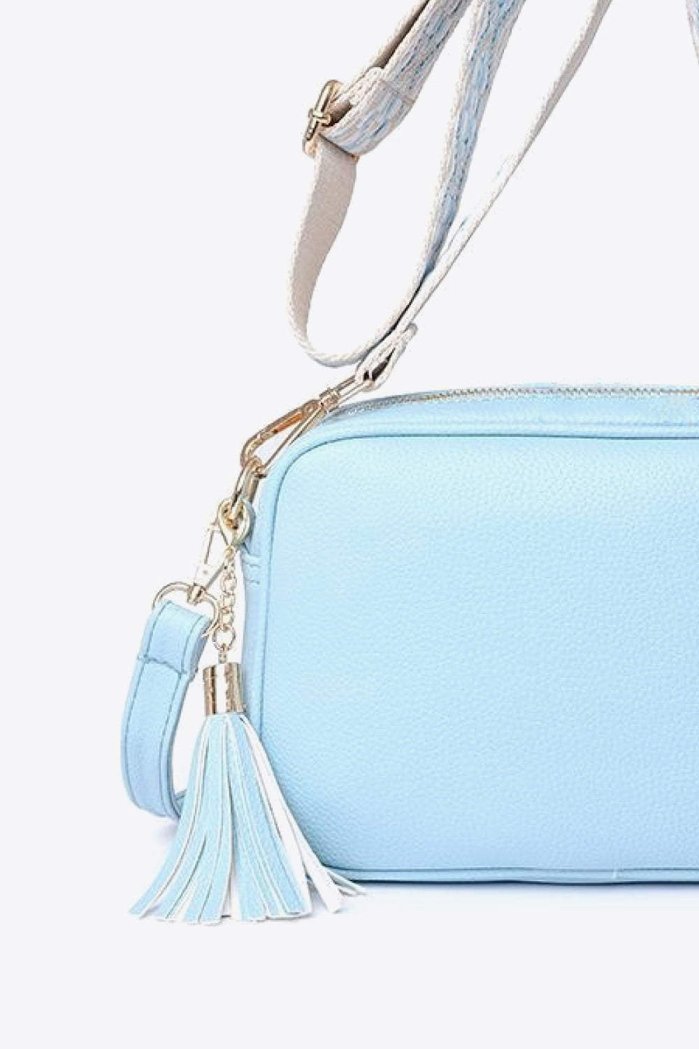 Vegan Leather Tassel Crossbody Bag - Add a touch of playful sophistication!