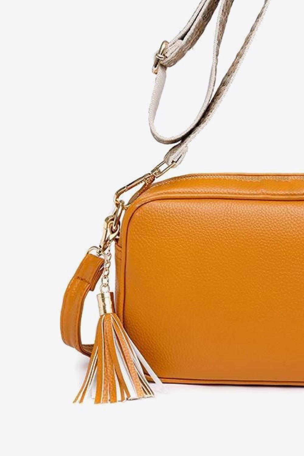 Vegan Leather Tassel Crossbody Bag - Add a touch of playful sophistication!