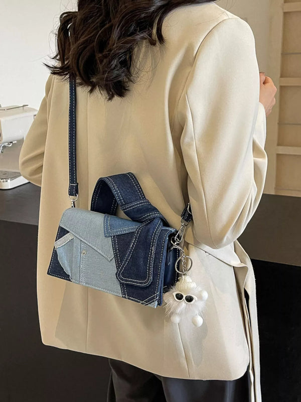 Two-tone denim patchwork mini crossbody bag with front snap pocket and top handle