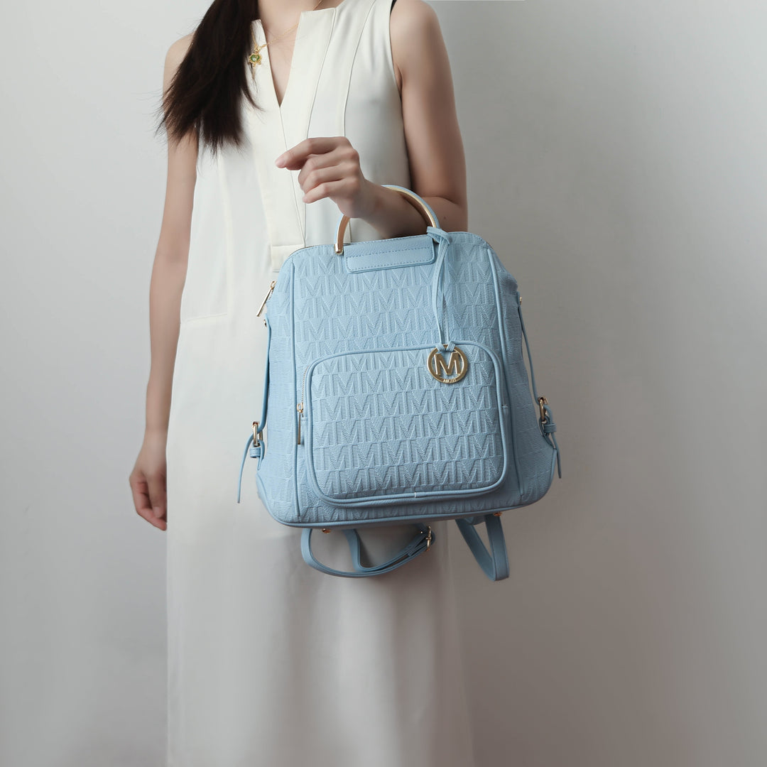 Beige embossed monogram vegan leather structured backpack with gold-tone hardware and sculpted top handle