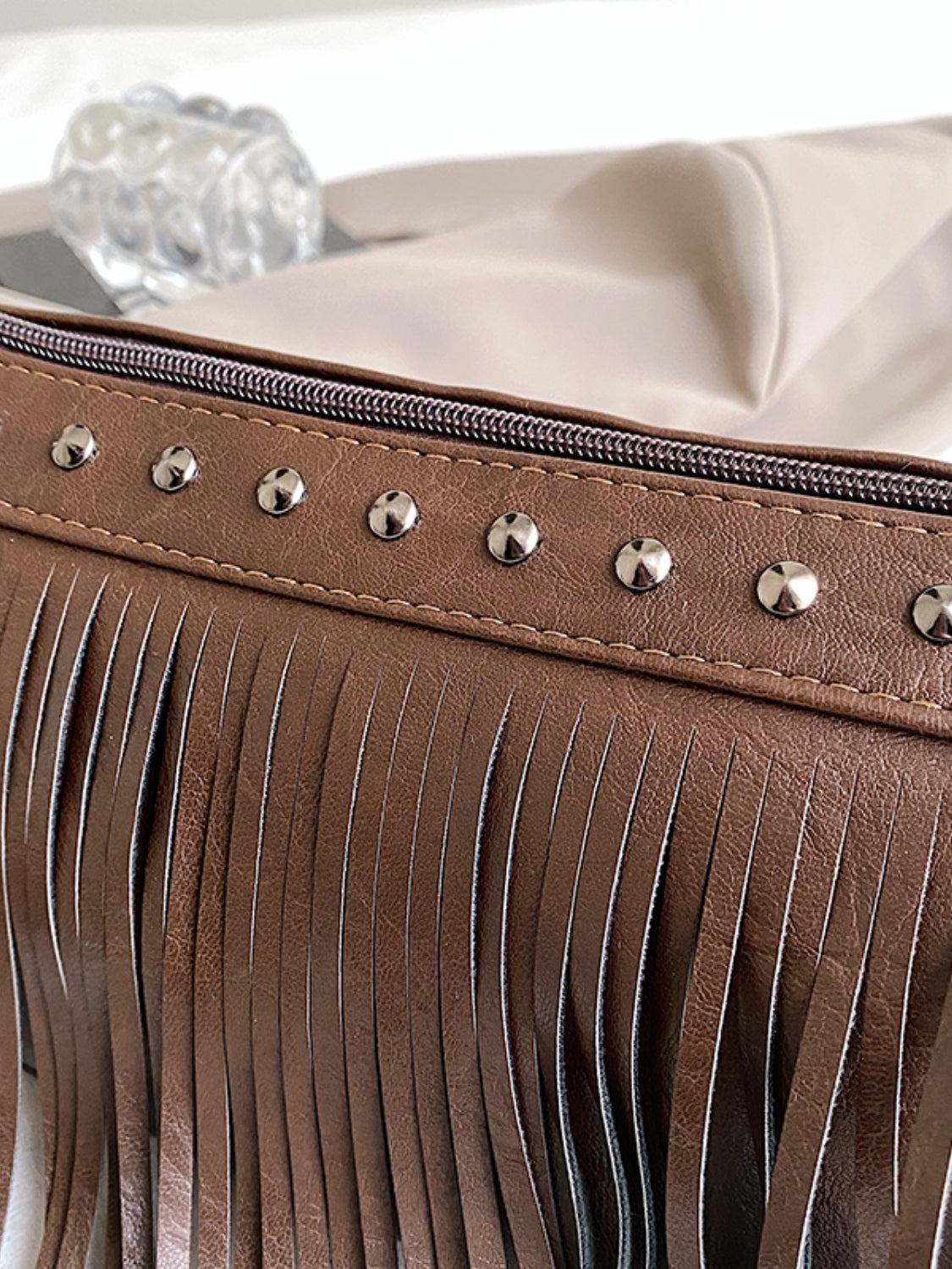 Vegan Leather Fringe Studded Crossbody Bag - Turn heads with this chic bag!