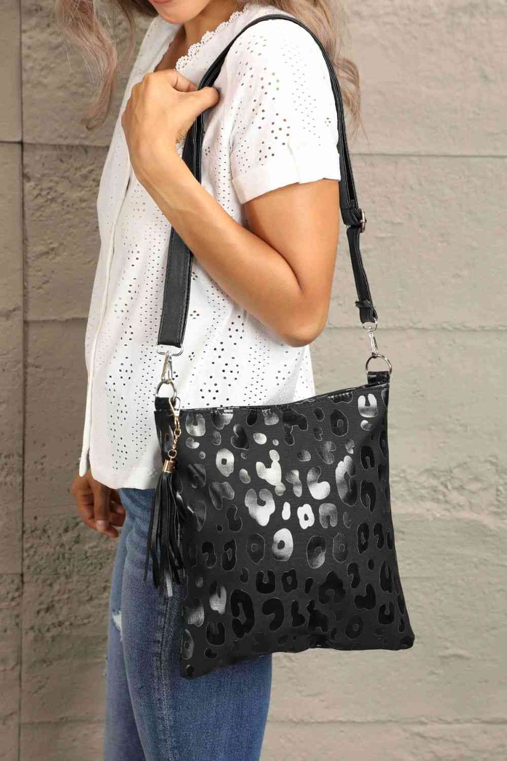 Adored Vegan Leather Shoulder Bag with Tassel - Effortlessly Stylish!