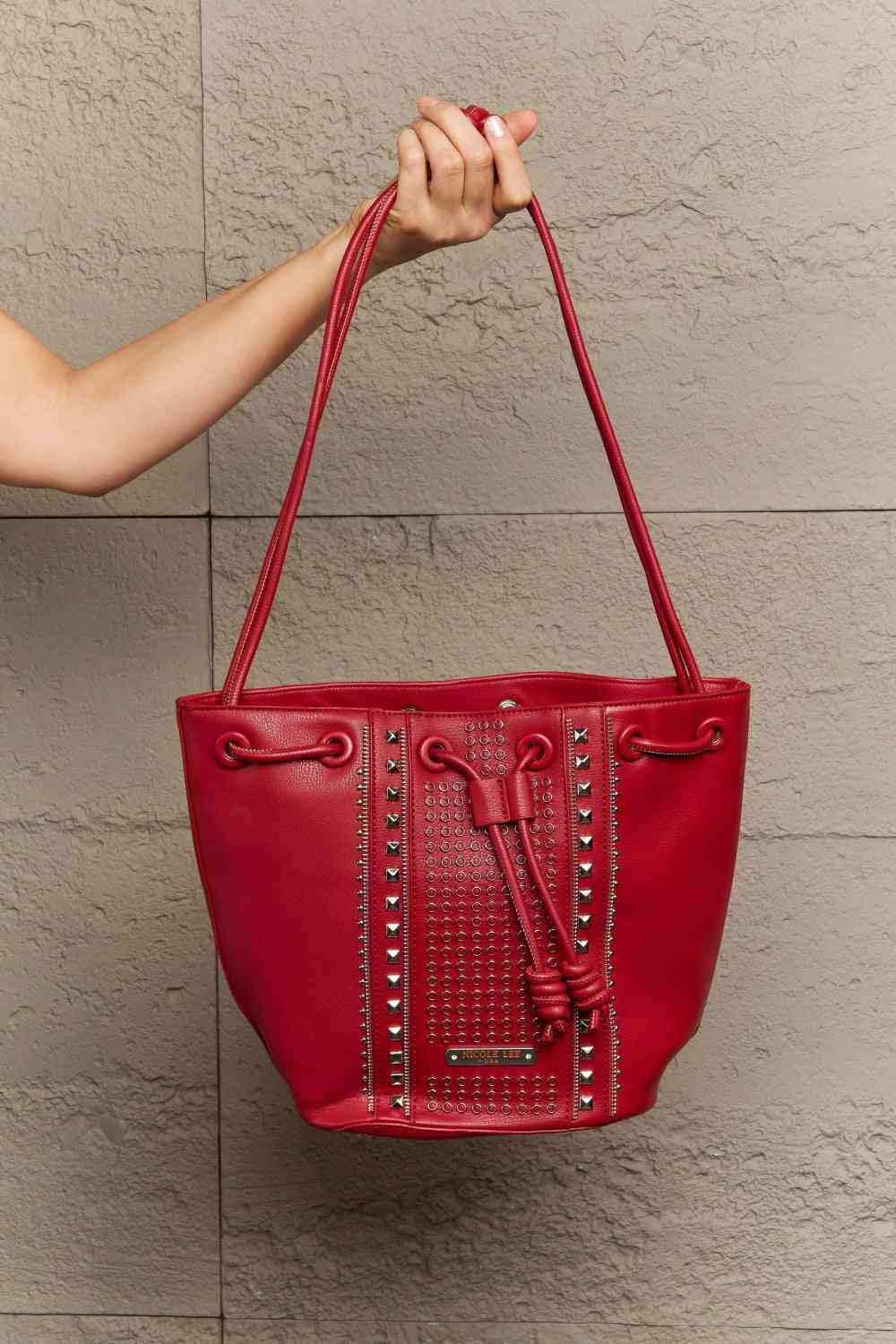 Nicole Lee USA Amy Stylish Leather Studded Bucket Tote Bag - Edgy Style with Effortless Charm!