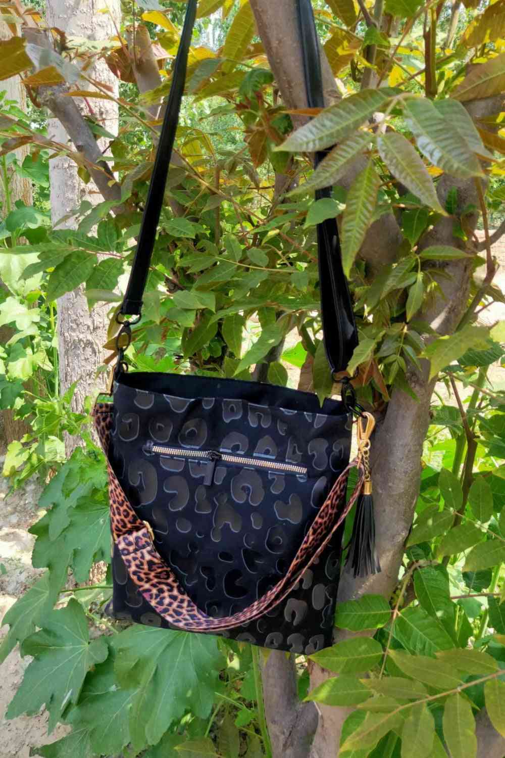 Adored Vegan Leather Shoulder Bag with Tassel - Effortlessly Stylish!