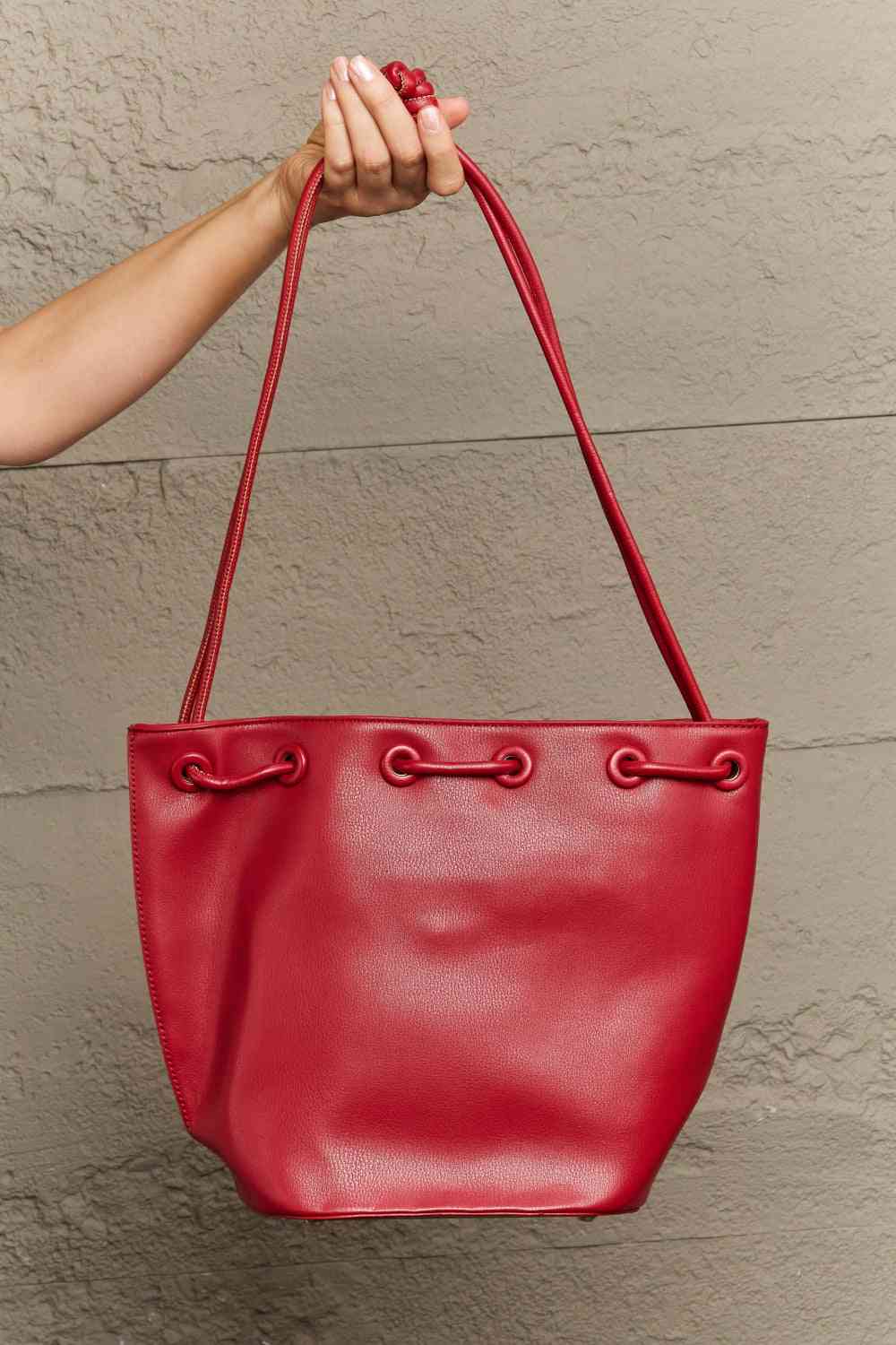 Nicole Lee USA Amy Stylish Leather Studded Bucket Tote Bag - Edgy Style with Effortless Charm!